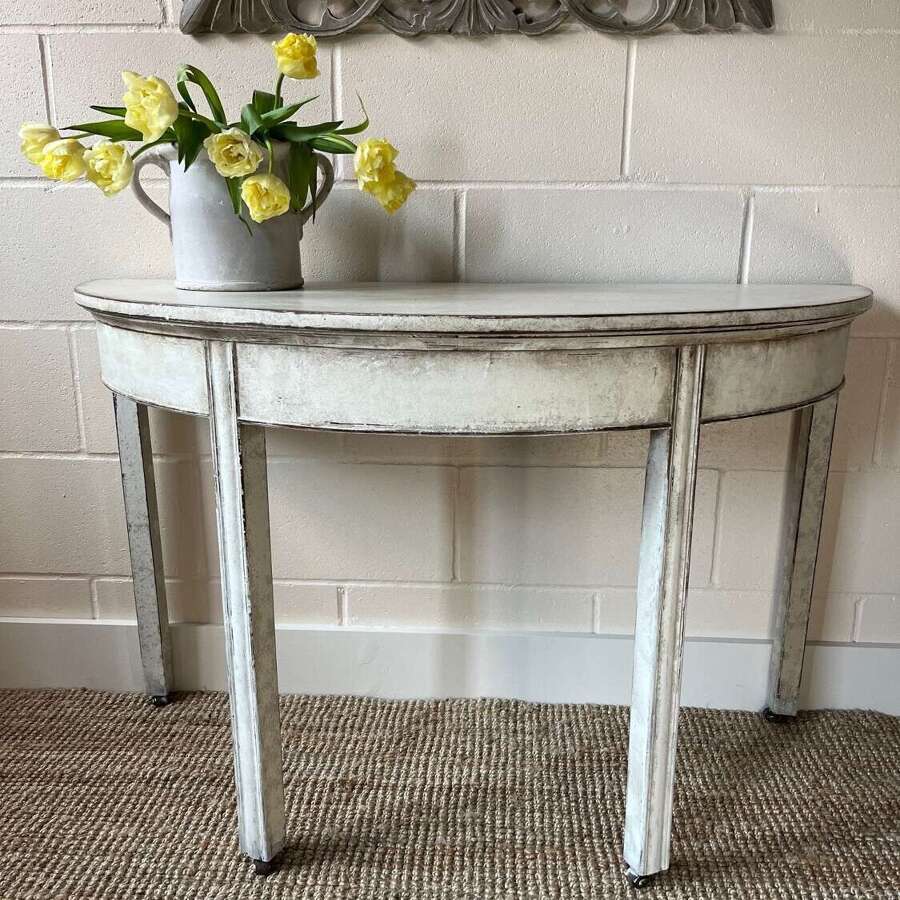 A Pair of Painted Georgian Demi Lune Console Tables