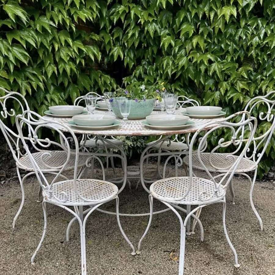 A Set of French Garden Table and Six Matching Chairs (19th century)