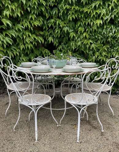 A Set of French Garden Table and Six Matching Chairs (19th century)