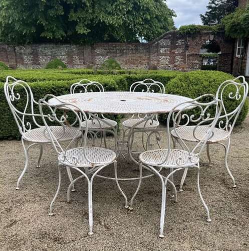 A Set of French Garden Table and Six Matching Chairs (19th century)