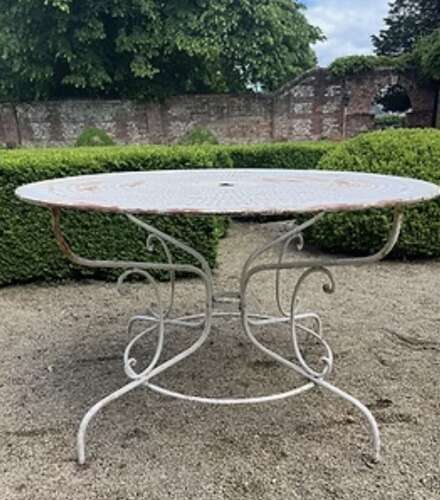 A Set of French Garden Table and Six Matching Chairs (19th century)